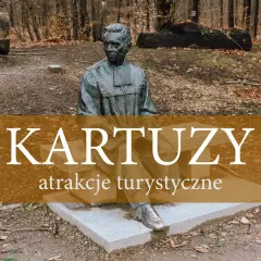 Pomnik w alei filozofów w Kartuzach, wśród jesiennych liści. Miejsce pełne historii i spokoju.